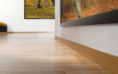 What are the advantages of a hidden skirting board compared to plastic and wooden ones